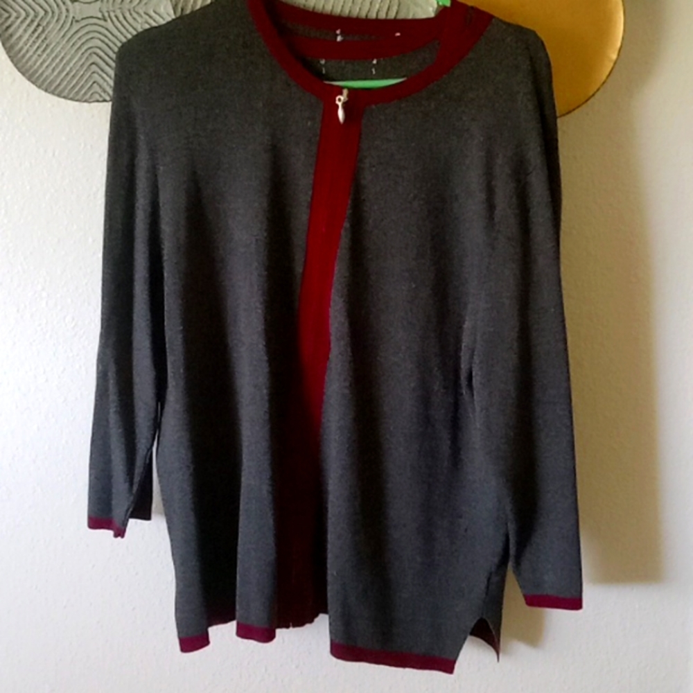 A two piece sweater with a vest